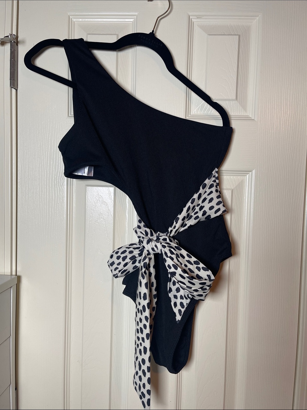Pink Lily Black One-Shoulder Cut Out Side Bodysuit with White Spot Tie